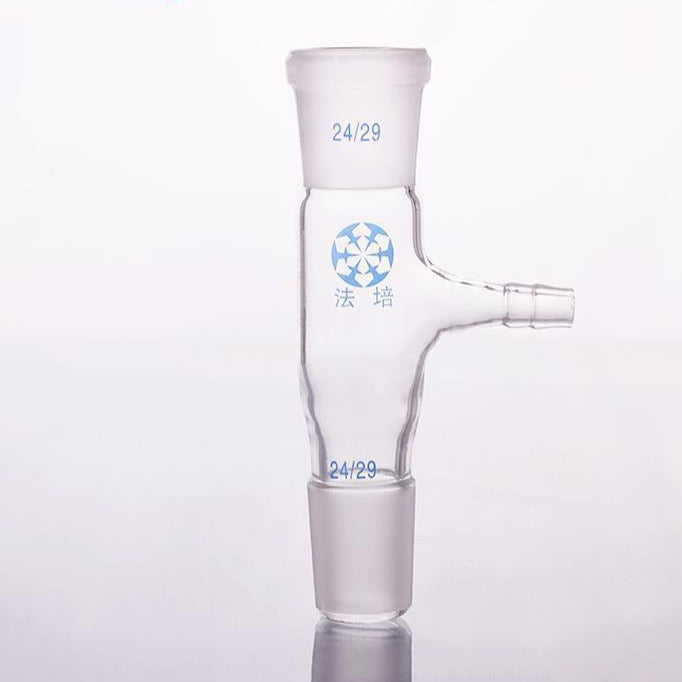 Connecting adapter with side hose connector